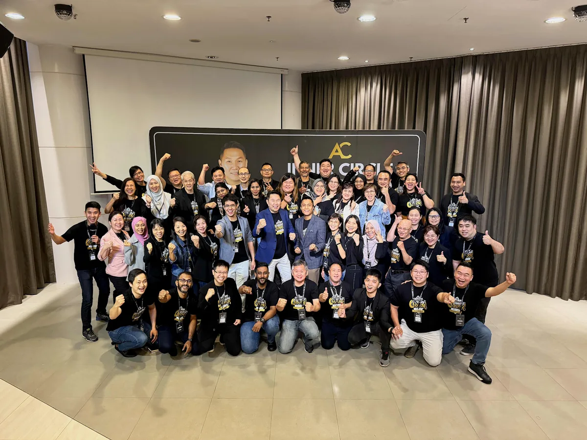 Aaron Chong with a room of his students